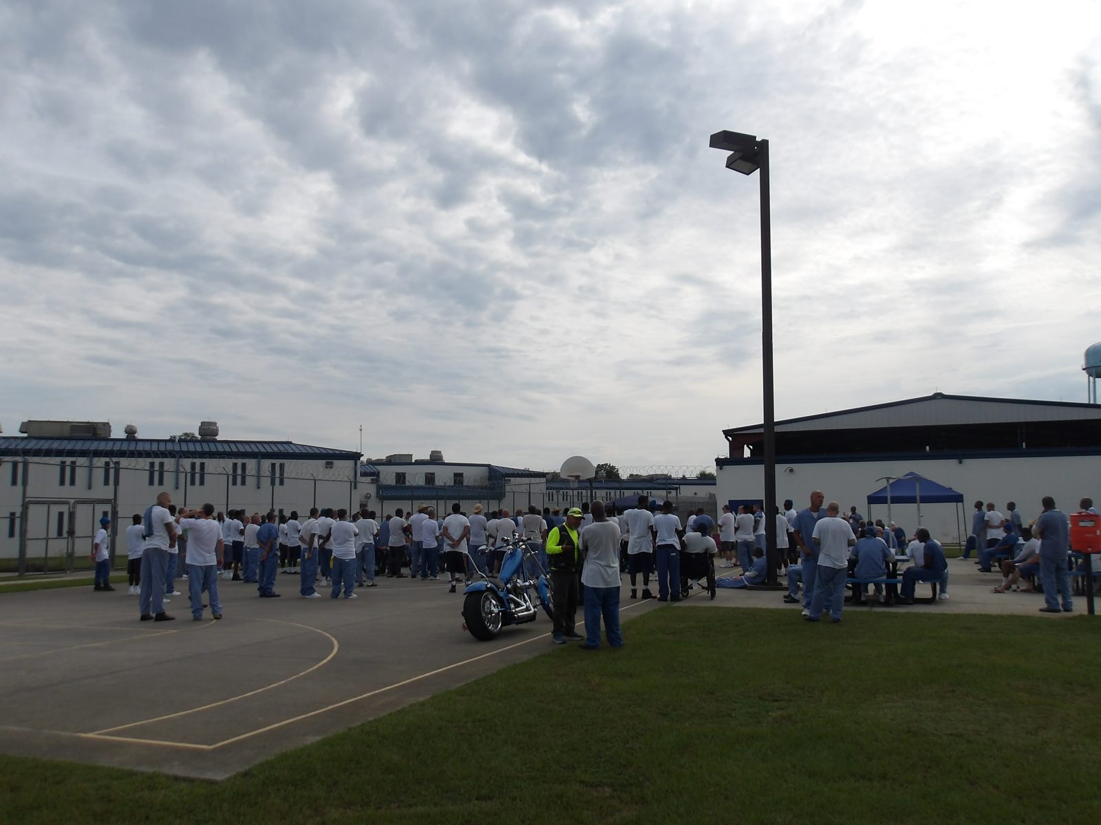 Inmates gathered on the yard for a Prison Yard Crusade